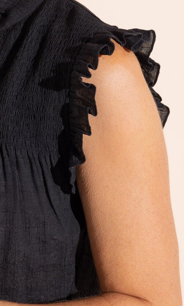 Sleeveless Frill Trim Top